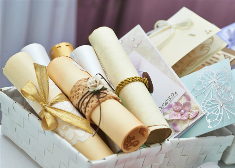 A box of scroll wedding invitations