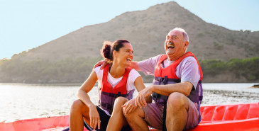 Father and daughter on canoe.