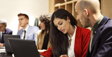 Business co-workers analysing documents