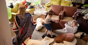 Children playing on living room floor.