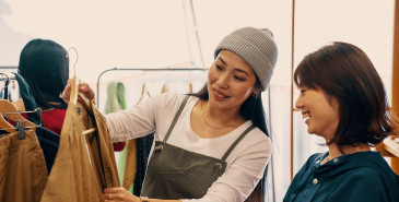 Two friends shopping for jacket