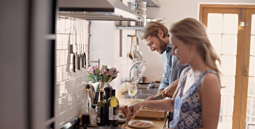 Couple cooking in kitchen together