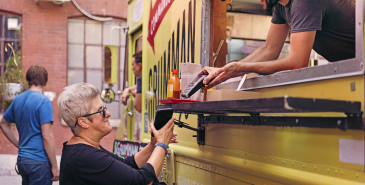 Customer using eftpos at food truck