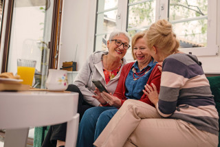 Friends chatting at home