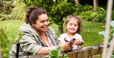 Mother and child gardening