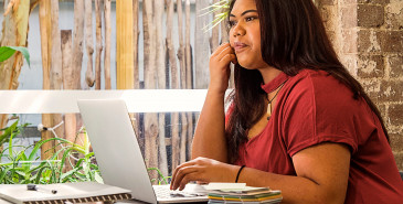 Young person working on laptop