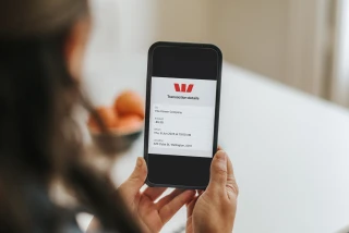 Person sharing proof of transaction in Westpac One