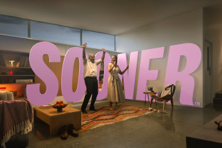 Couple dancing in their lounge