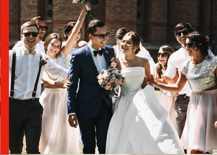 Bride and Groom at a wedding A Bride and Groom at a wedding surrounded by their wedding party