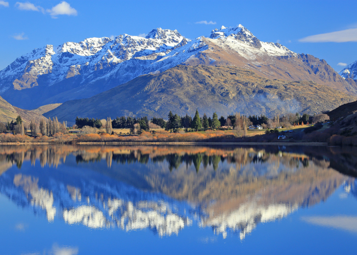 Central Otago mountains reflected in a lake 