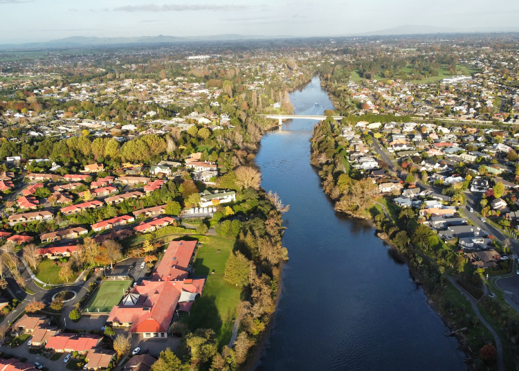An aerial shot of Hamilton with the Waikato River flowing through it