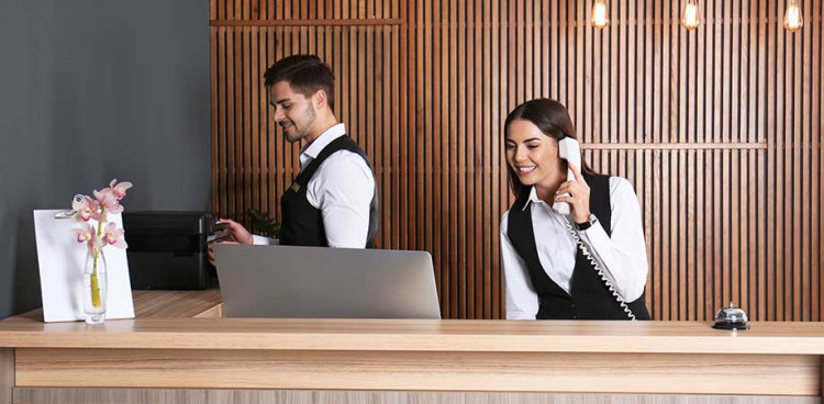 Hotel reception staff. Hotel reception staff.
