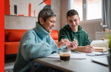 Kids in care An adult guides a young person in theor studies