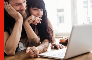 Couple reviewing mortgage options A trendy young couple looking at a laptop