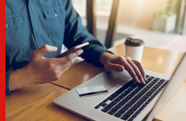 Photo of a man making a payment online