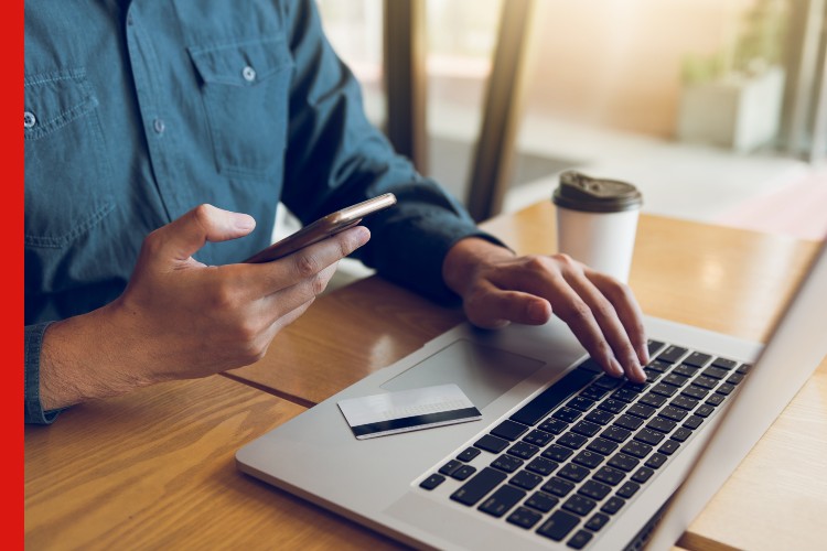 Online payments Photo of a man making a payment online