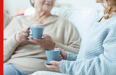 Photo of two women talking