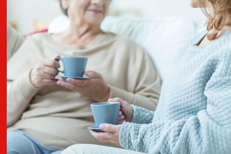 Photo of two women talking