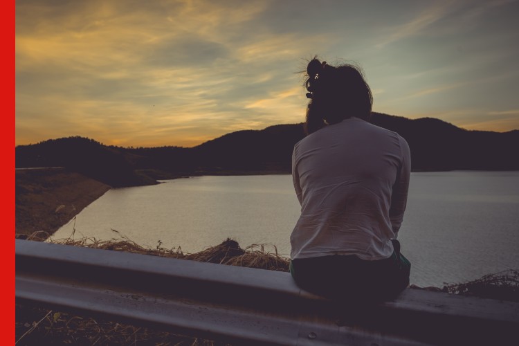 Photo of woman alone thinking