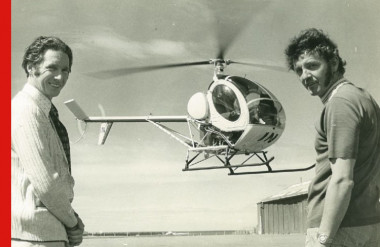 Photo of Peter Button with a helicopter