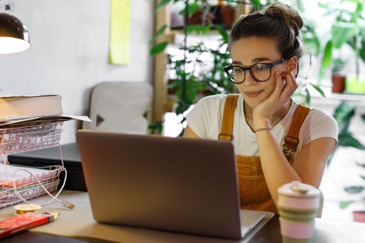 Photo of woman working from home